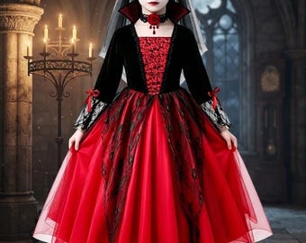 May include: A floor-length dress featuring a black velvet bodice with a red floral pattern, long sleeves with lace cuffs, and a full red tulle skirt. The outfit includes a black choker with a red rose, a red rose headpiece, and a veil.