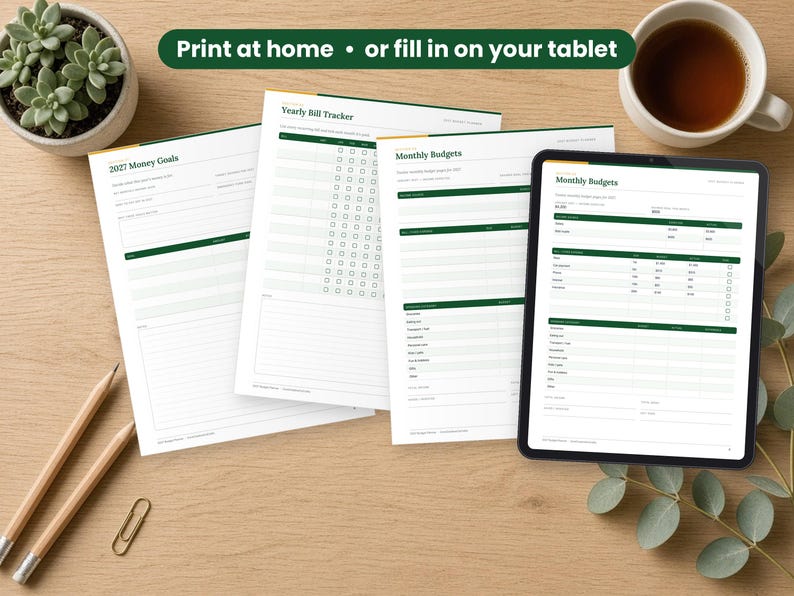 2027 Budget Planner printed on a desk and shown on a tablet, printable and fillable