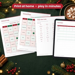 Christmas Party Games printed on a desk and shown on a tablet, printable