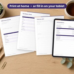 2027 Goal Setting Workbook printed on a desk and shown on a tablet, printable and fillable