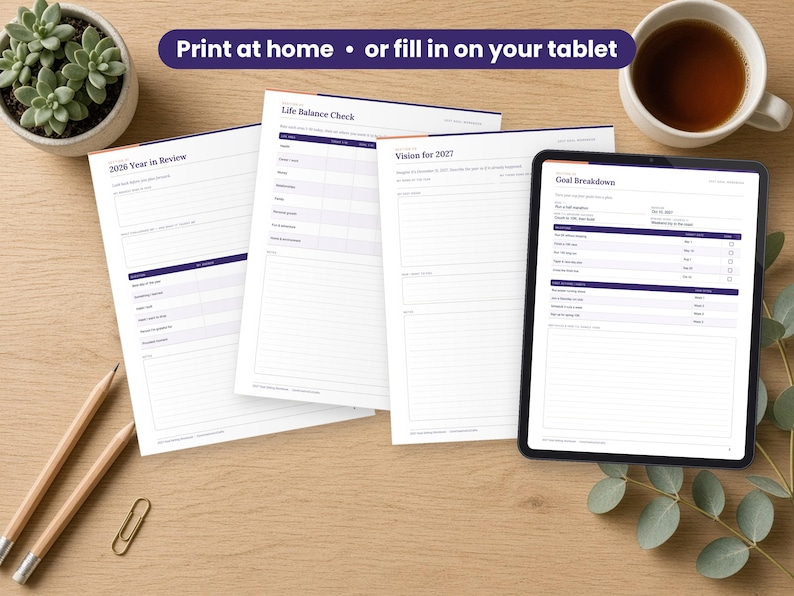 2027 Goal Setting Workbook printed on a desk and shown on a tablet, printable and fillable