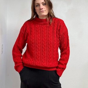 Rode gebreide trui met mockneck