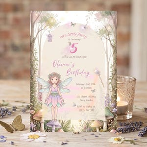 Puede incluir: Una tarjeta de invitación de cumpleaños rectangular con una ilustración de hada, setas y follaje de bosque. El texto dice: our little fairy is turning 5, Join us to celebrate, Olivia's Birthday, Saturday Sept 19th at 1:00pm, 332 Street Address, Fairy Garden, RSVP to Sophy at (123) 567 982.