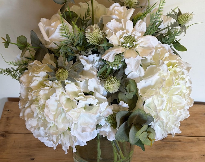 Handtied arrangement vase not included can be brought separately