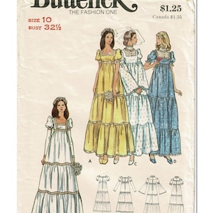 May include: Butterick pattern 6961 for a floor-length dress in size 10 with a 32.5 inch bust. The envelope features illustrations of four variations of the dress with tiered skirts, square necklines, and puff sleeves in yellow, white, and blue.