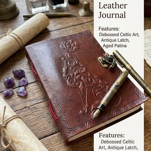 May include: A brown leather journal featuring a debossed Celtic wolf design on the cover, an antique metal latch, and red binding thread. The cover text reads: Item: Handmade Celtic Wolf Leather Journal. Features: Debossed Celtic Art, Antique Latch, Aged Patina.