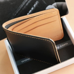 Cartera para hombre de cuero cosido a mano - Cuero curtido vegetal - Buttero negro y natural de Conceria Walpier - 010218