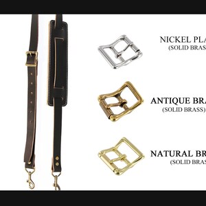 May include: A black leather guitar strap with two adjustable buckles. The buckles are available in three finishes: nickel plate, antique brass, and natural brass. All buckles are made of solid brass.