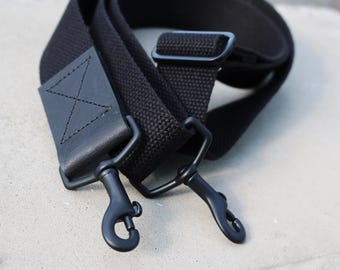 1.50 in wide black adjustable cotton webbing shoulder strap with leather accent - black hardware