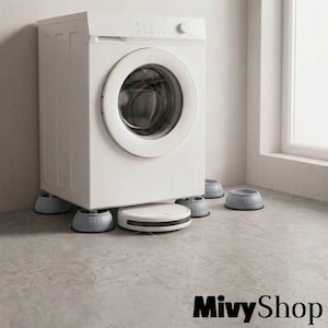 May include: A white front-loading washing machine elevated by four grey circular anti-vibration pads. A white robotic vacuum cleaner is positioned directly underneath the machine. The text MivyShop is visible in the bottom right corner.