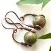 see more listings in the Earrings : green section