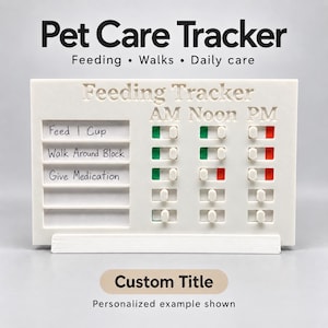 Könnte beinhalten: Ein weißes, rechteckiges Haustier-Pflege-Tracker-Board mit dem Text Pet Care Tracker, Feeding, Walks, Daily care und Feeding Tracker. Es enthält Zeilen für Aufgaben wie Feed 1 Cup, Walk Around Block und Give Medication mit Schiebereglern für AM, Noon und PM.