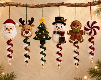 May include: Six crochet Christmas ornaments hanging from a branch, including Santa Claus, a reindeer, a Christmas tree, a snowman, a gingerbread person, and a peppermint candy, each featuring a dangling spiral tail with a small wooden bead.