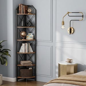 May include: A tall, five-tier corner bookshelf featuring a black metal frame with an X-shaped back support and brown wood-grain shelves. The shelves are filled with various decorative items, including books, a globe, vases, and a woven basket.