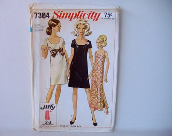 May include: Simplicity sewing pattern number 7384 for a dress. The pattern is for a miss size 16. The pattern shows three different styles of dresses. The first dress is white with a brown belt. The second dress is black. The third dress is a floral print. The pattern is labeled "Jiffy 2-3 easy cut-easy sew".