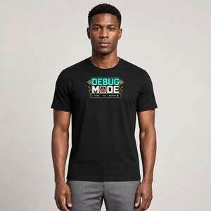 Software Developer Debugging graphic T-shirt in black, male model mid-length front
