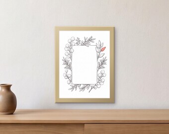 May include: A rectangular wall art print in a gold frame featuring a central white rectangle surrounded by a black line drawing of various botanical leaves and branches, with a single small leaf colored in a soft salmon pink hue.