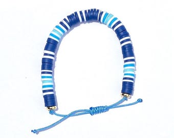 Blue and white adjustable beaded bracelet.