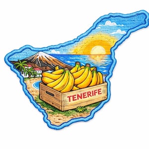 May include: An embroidered patch shaped like the island of Tenerife, featuring a wooden crate filled with yellow bananas, a mountain, palm trees, and a sunset over the ocean. The word TENERIFE is printed in red letters on the front of the crate.