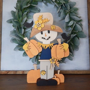 Fall chunky standing scarecrow with pumpkins shelf decor