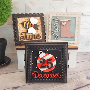 4 inch frame and seasonal inserts. Interchangeable home decor signs for the seasons and holidays