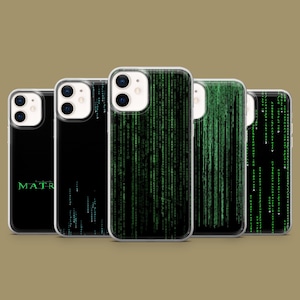 May include: Five smartphone cases featuring The Matrix-inspired digital rain patterns. The designs include green vertical code, black backgrounds, and the word MATRIX in green text. Each case has a dual-lens camera cutout on the upper left corner.