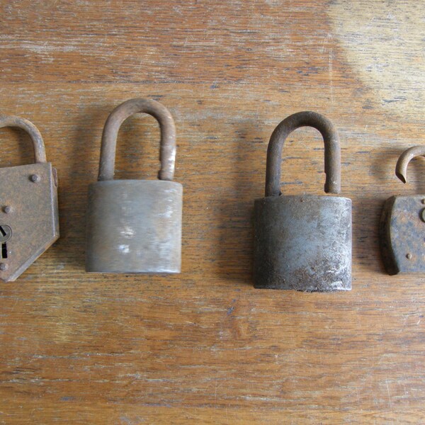 RUSTY four antique padlocks of varying ages , free uk postage