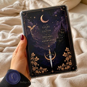 May include: A clear tablet case featuring a dark purple and black night sky illustration with a crescent moon, a castle, a dragon, and a dagger. The text reads: TO THE STARS WHO LISTEN AND THE DREAMS THAT ARE ANSWERED. Gold rose vines frame the bottom.