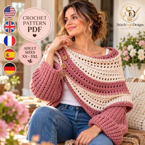May include: A crochet pattern PDF for a two-toned shrug featuring a dusty rose and cream color scheme. The garment has a ribbed texture, long sleeves, and three wooden buttons along the diagonal front closure. It is available in adult sizes XS-5XL.
