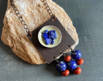 Enameled copper, lapis lazuli, and red jasper pendant on long single chain necklace