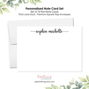 May include: A set of 10 personalized flat note cards with white card stock and square flap envelopes. The cards feature the text "sophia michelle" in black cursive script.