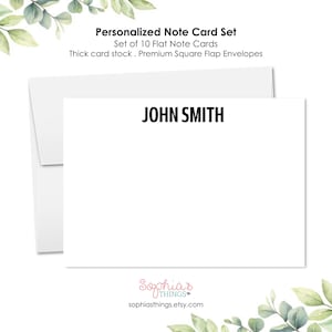 May include: A set of 10 personalized flat note cards with white card stock and black ink. The cards feature the name "JOHN SMITH" printed in a bold, sans-serif font. The cards come with premium square flap envelopes.