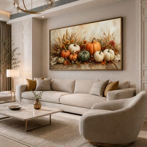 May include: A rectangular wall art print featuring a harvest scene with various pumpkins in shades of orange, green, and white, arranged with dried wheat, grasses, and autumn leaves on a rustic wooden surface, framed in a thin gold-toned border.