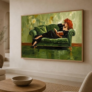 May include: A rectangular wall art print featuring an oil painting of a person with vibrant red hair reclining on a dark green velvet sofa. The person wears a black dress and black high heels while reading an open book. The background is green.