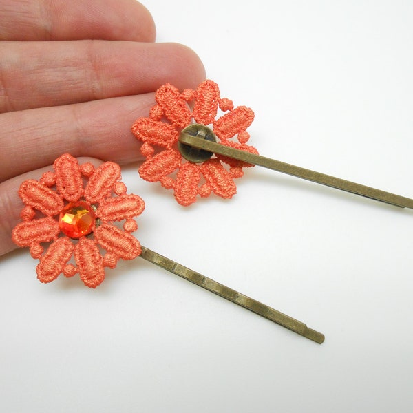 Barrettes en dentelle oranges avec des strass en cristal