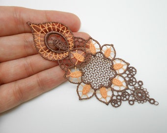 Brown and orange lace applique