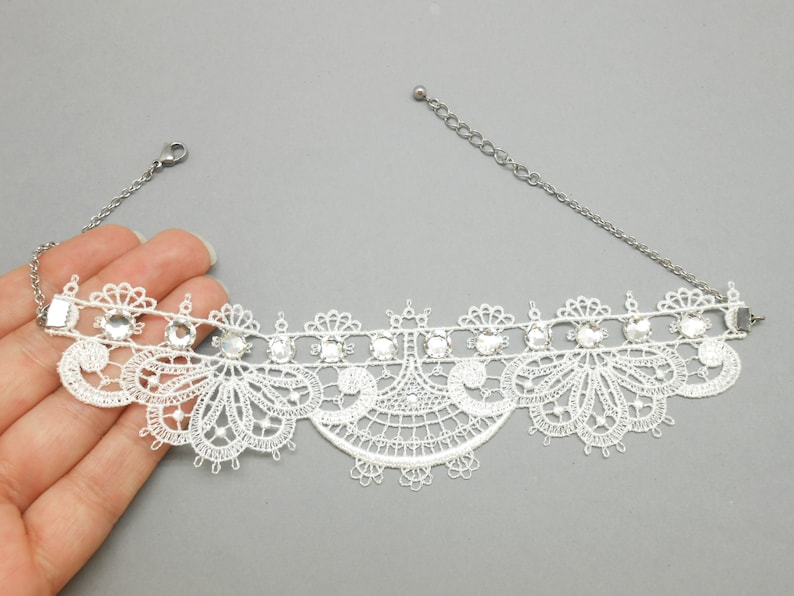 White lace neck tower with crystal rhinestones