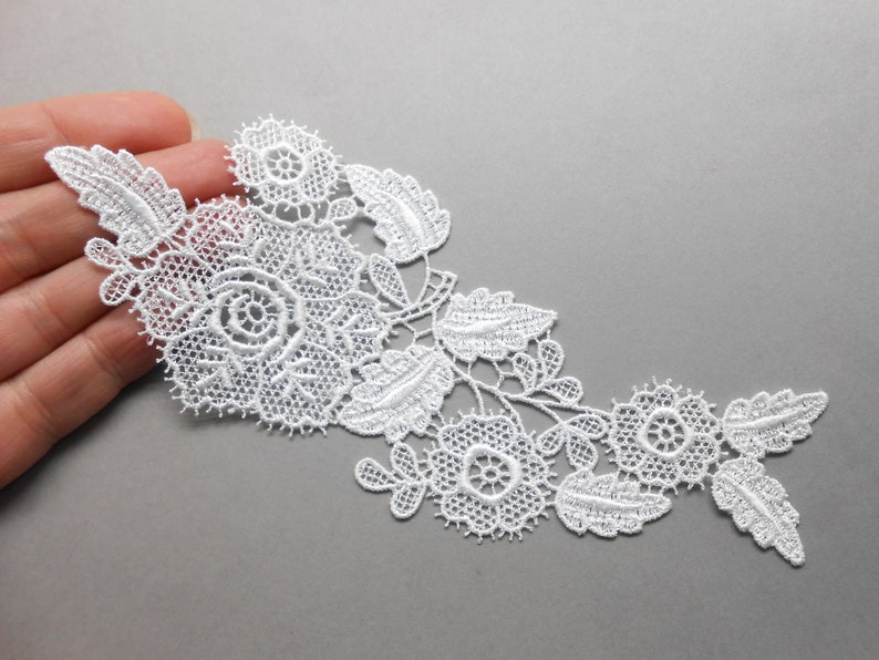 White lace applique measuring 16 x 6.5 cm image 1