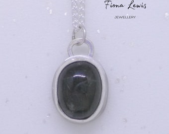Dark bottle green Emerald oval cabochon pendant made in solid recycled silver, OOAK, gift, contemporary jewellery style, by Fiona Lewis UK