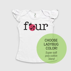 May include: A white short-sleeved shirt with ruffled sleeves featuring the black text "four" with a pink ladybug replacing the letter "o". A light green circle overlay contains the dark green text "CHOOSE LADYBUG COLOR! Super-soft poly-cotton blend".
