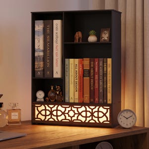 May include: A dark brown wooden desktop bookshelf featuring multiple storage compartments, a row of books, decorative figurines, and a bottom drawer with an illuminated, intricate geometric lattice front panel that emits a warm, soft glow.