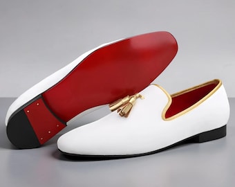 Christian Louboutin Men's white leather loafers with gold accents