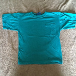 Vintage 90&#39;s Body Ragz Aqua Colored Short Sleeve Pocket T-Shirt