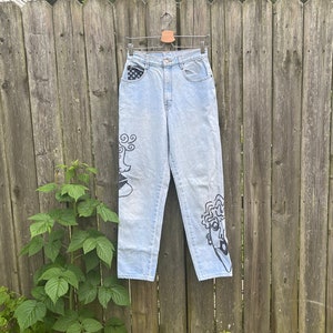 Vintage 90&#39;s Gitano Light Wash High Waist Hand Drawn Faces Tapered Leg Denim Jeans Talla 4