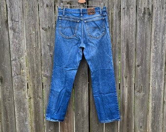 Vintage 90’s Lee Medium Wash Mid Rise Regular Fit Tapered Leg Denim Jeans Size 33x30