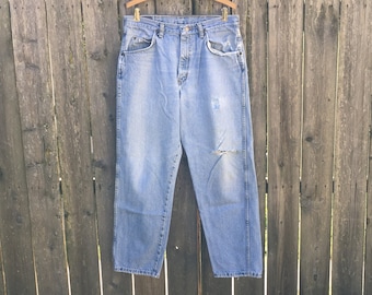 Vintage 90's Wrangler Authentic Jeans Light Wash High Waist Distressed Denim Jeans Waist Measures 33 Inches