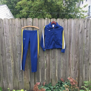 Vintage 1990&#39;s Speedo Two Piece Blue Yellow and White Zip Up 100% Polyester Long Sleeve Low Rise Long Pant Insulated Track Suit Size Small