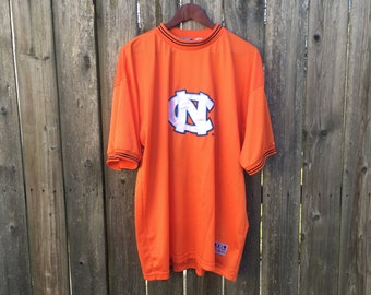 Vintage 90's North Carolina Tar Heels Plus J Orange Short Sleeve Mesh Jersey Size XXL