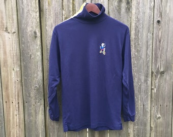 Vintage 90's Paco Jeans Dark Blue Embroidered Rollerblader Logo Long Sleeve Turtleneck Shirt Size Small