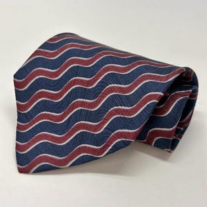 Giorgio Armani Cravatte 100% Silk Tie With Red & White Wave Pattern On Blue Background